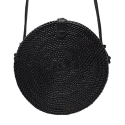 Poppy and Sage black circle rattan straw shoulder bag handmade in Bali.