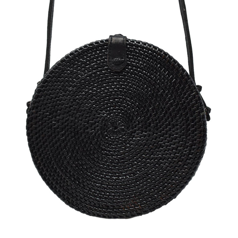 Poppy and Sage black circle rattan straw shoulder bag handmade in Bali.